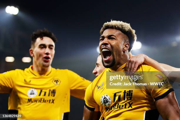 Adama Traore of Wolverhampton Wanderers celebrates after scoring his team's third goal during the Premier League match between Wolverhampton...