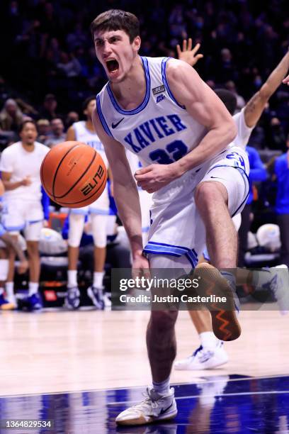 Zach Freemantle of the Xavier Musketeers reacts after a dunk during the second half against the Creighton Bluejays at Cintas Center on January 15,...