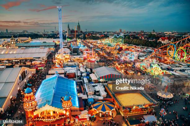 aerial view of oktoberfest fairgrounds, munich, germany - beer festival stock pictures, royalty-free photos & images