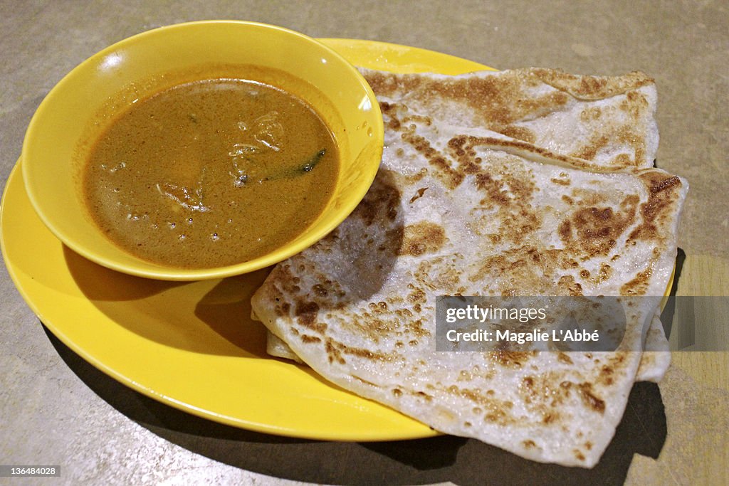 High Resolution Roti Roti Canai High-Res Stock Photo - Getty Images