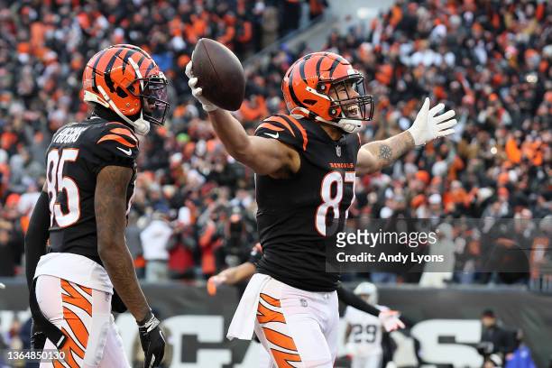 Tight end C.J. Uzomah of the Cincinnati Bengals celebrates after catching a first half touchdown pass against the Las Vegas Raiders during the AFC...