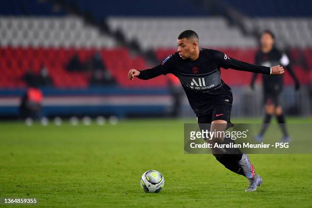 Kylian Mbappe of Paris Saint-Germain runs with the ball during the Ligue 1 Uber Eats's game between Paris Saint-Germain and Brest at Parc des Princes...