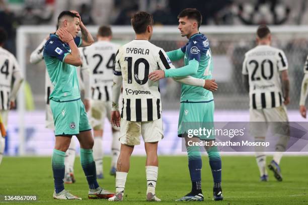 Paulo Dybala of Juventus salutes fellow Argentinians Nehuen Perez and Ignacio Pussetto of Udinese Calcio following the final whistle of the Serie A...
