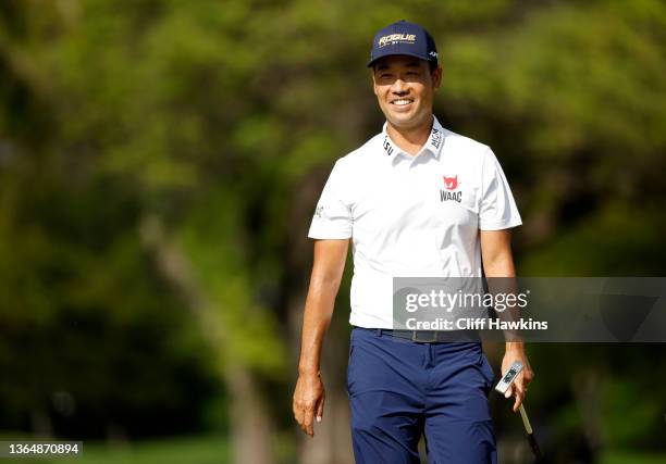 Kevin Na of the United States smiles on the 13th green during the third round of the Sony Open in Hawaii at Waialae Country Club on January 15, 2022...