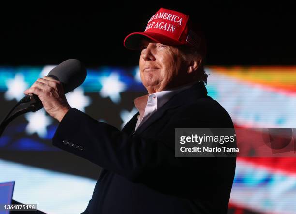 Former President Donald Trump prepares to speak at a rally at the Canyon Moon Ranch festival grounds on January 15, 2022 in Florence, Arizona. The...