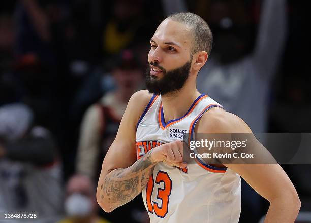 Evan Fournier of the New York Knicks reacts after hitting a three-point basket against the Atlanta Hawks during the second half at State Farm Arena...