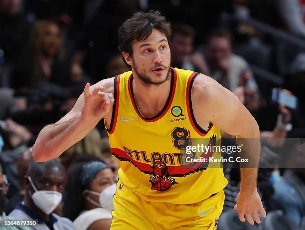 Danilo Gallinari of the Atlanta Hawks reacts after hitting a three-point basket against the New York Knicks during the first half at State Farm Arena...