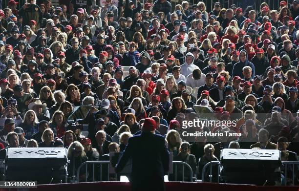 Former President Donald Trump speaks at a rally at the Canyon Moon Ranch festival grounds on January 15, 2022 in Florence, Arizona. The rally marks...