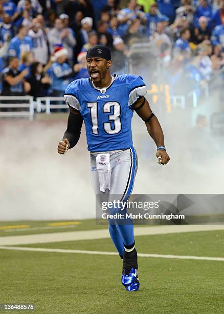 Nate Burleson of the Detroit Lions runs onto the field during player introductions before the game against the San Diego Chargers at Ford Field on...