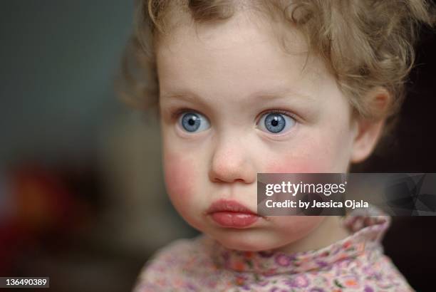 close-up of two-year-old girl face - flushing stock pictures, royalty-free photos & images