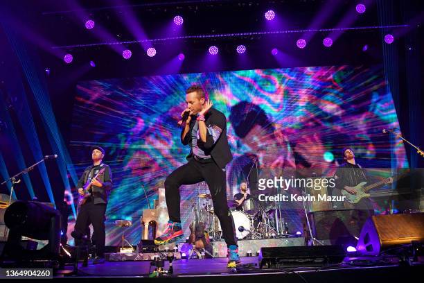 Jonny Buckland, Chris Martin, Will Champion, and Guy Berryman of Coldplay perform onstage at the 2022 iHeartRadio ALTer EGO presented by Capital One...