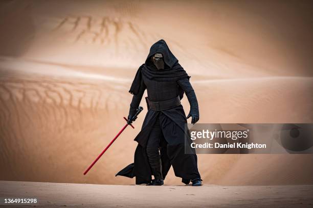 Star Wars cosplayer Shane Holly as Kylo Ren poses for photos at Buttercup Sand Dunes on January 15, 2022 in Winterhaven, California. Buttercup San...