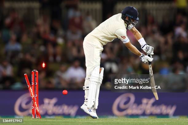 Joe Root of England is bolwed by Scott Boland of Australia during day three of the Fifth Test in the Ashes series between Australia and England at...