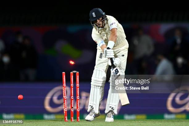 Joe Root of England is bowled out by Scott Boland of Australia during day three of the Fifth Test in the Ashes series between Australia and England...