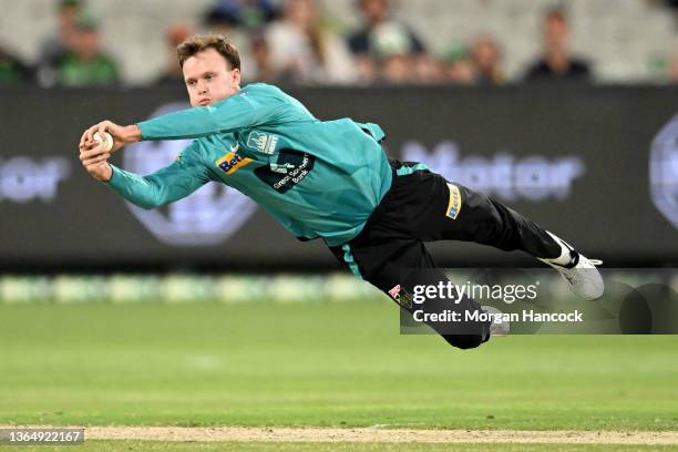 Matt Kuhnemann of the Heat dives for the ball during the Men's Big Bash League match between the Melbourne Stars and the Brisbane Heat at Melbourne...