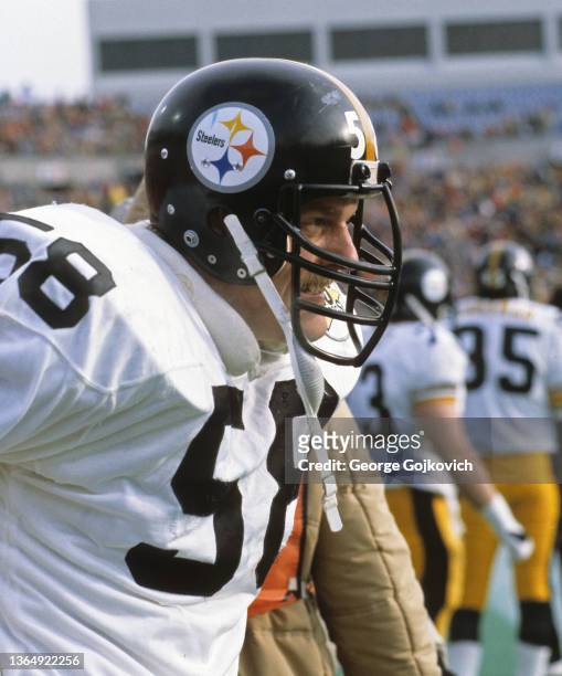 Linebacker Jack Lambert of the Pittsburgh Steelers looks on from the sideline during a game against the Buffalo Bills at Rich Stadium on December 12,...