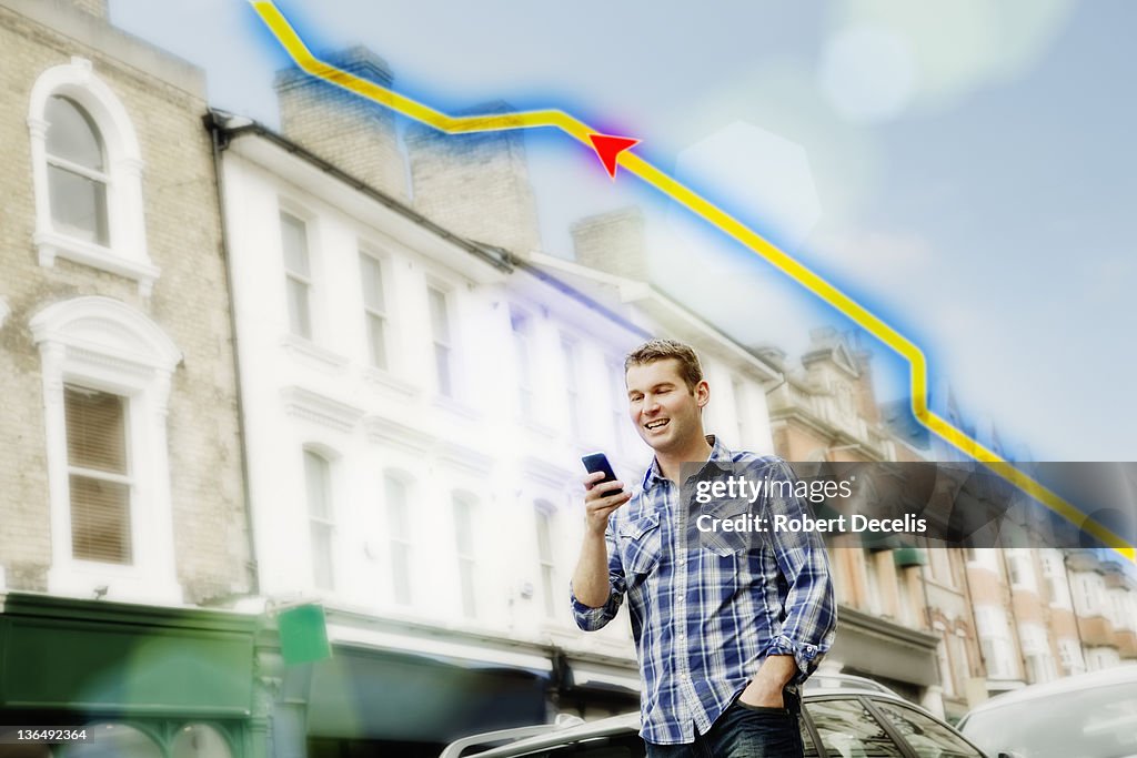 Man using smart phone for directions