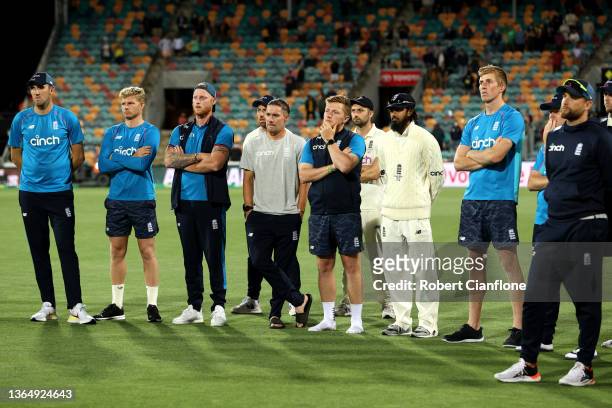 England players look on after losing the Fifth Test in the Ashes series between Australia and England at Blundstone Arena on January 16, 2022 in...