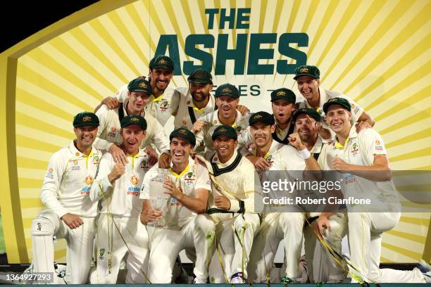 Australia celebrate after winning the Fifth Test in the Ashes series between Australia and England at Blundstone Arena on January 16, 2022 in Hobart,...