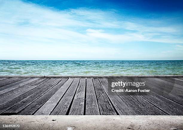 ocean pier - wood pier stock pictures, royalty-free photos & images