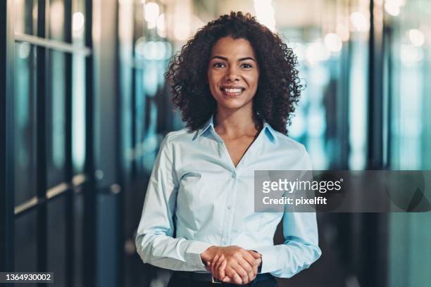 portrait of a beautiful young businesswoman - woman black shirt stock pictures, royalty-free photos & images