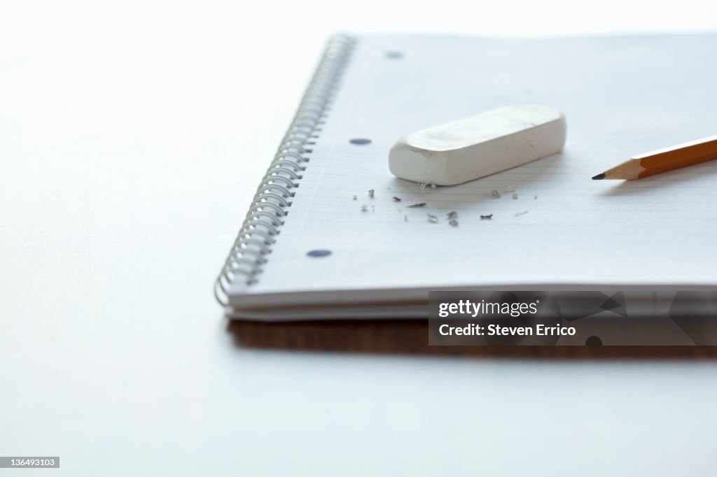 Notebook Eraser Eraser And Pencil Sitting On A Notebook High-Res Stock Photo - Getty Images