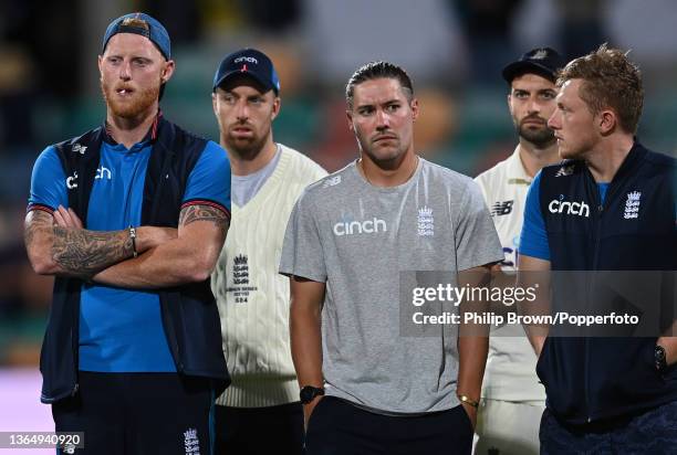 Ben Stokes , Jack Leach, Rory Burns, Mark Wood and Dom Bess watch the presentations after Australia won the Fifth Test in the Ashes series between...