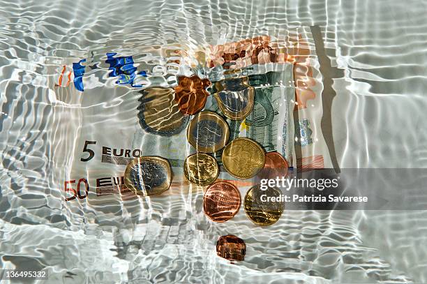 euro underwater - money laundering fotografías e imágenes de stock