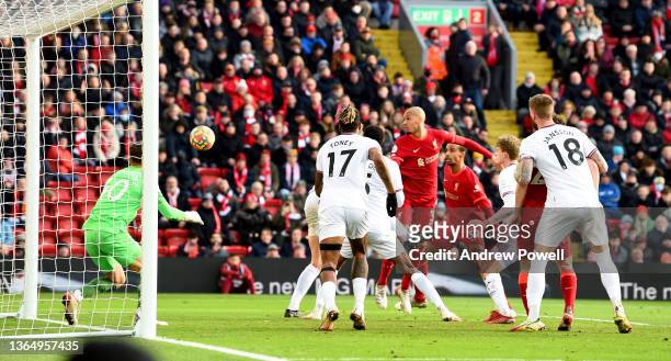 Fabinho of Liverpool scores the opening goal during the Premier League match between Liverpool and Brentford at Anfield on January 16, 2022 in...