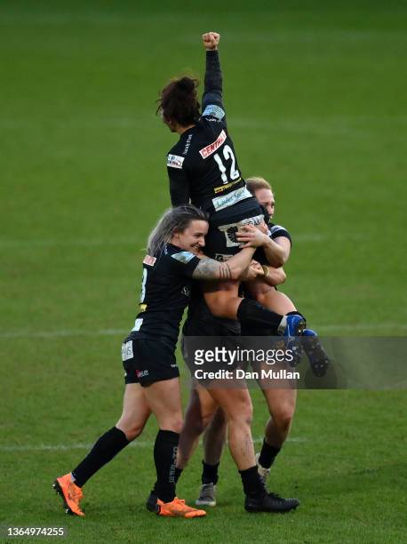 Patricia Garcia of Exeter Chiefs is mobbed by her team mates after kicking the winning penalty during the Women's Allianz Premier 15s match between...