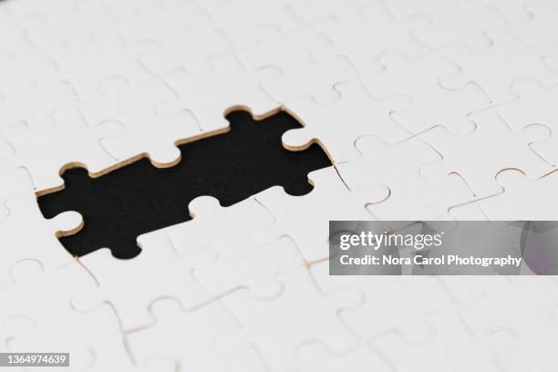 two missing jigsaw puzzle - missing jigsaw piece stock pictures, royalty-free photos & images