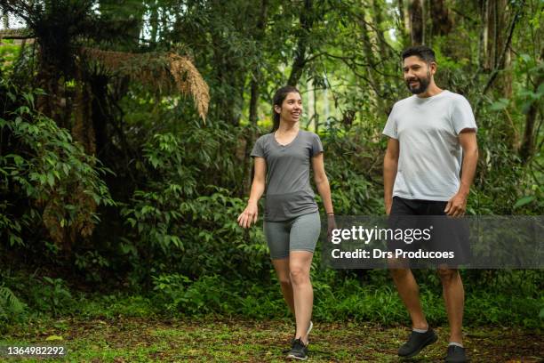 friends walking in the park - speed walking stock pictures, royalty-free photos & images