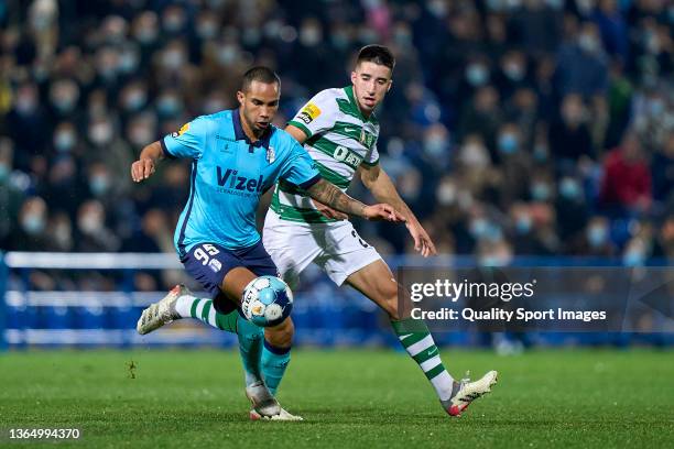 Goncalo Inacio of Sporting CP competes for the ball with Guilherme Schettine of FC Vizela during the Liga Portugal Bwin match between FC Vizela and...