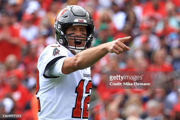 Tom Brady of the Tampa Bay Buccaneers points against the Philadelphia Eagles during the first quarter in the NFC Wild Card Playoff game at Raymond...