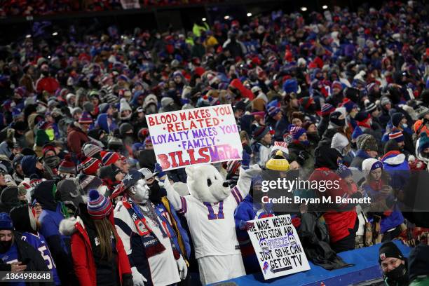 Fans during the first quarter of a game between the Buffalo Bills and the New England Patriots at Highmark Stadium on January 15, 2022 in Buffalo,...