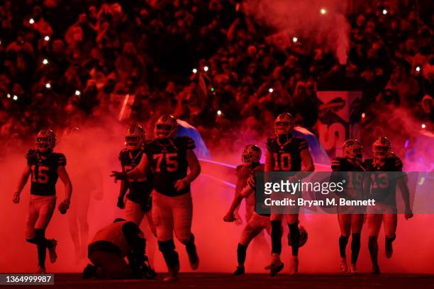 Buffalo Bills run on the field prior to a game against the New England Patriots at Highmark Stadium on January 15, 2022 in Buffalo, New York.