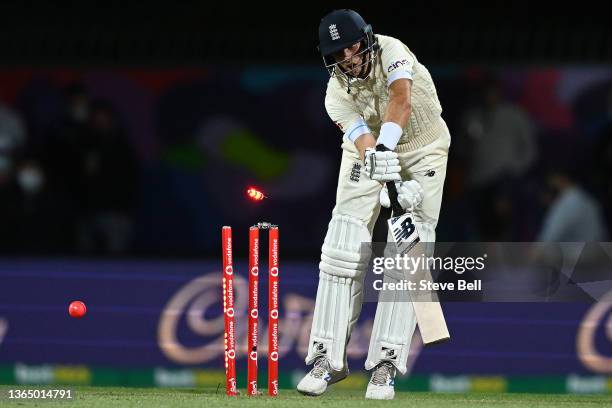 Joe Root of England is bowled by Scott Boland of Australia during day three of the Fifth Test in the Ashes series between Australia and England at...