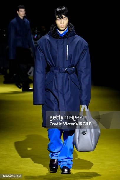 Model walks the runway during the Prada Ready to Wear Fall/Winter 2022-2023 fashion show as part of the Milan Men Fashion Week on January 16, 2022 in...