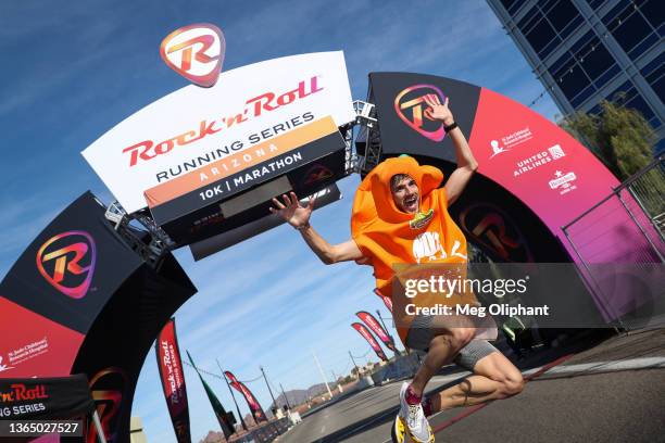 Jordan Maddocks completes the Rock 'n' Roll Running Series dressed as a carrot to break the Guinness World Record for fastest marathon ran in a...