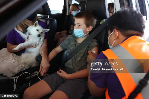 Harrison Nelligan is vaccinated at the drive-through vaccination centre at North Shore Events Centre on January 17, 2022 in Auckland, New Zealand....