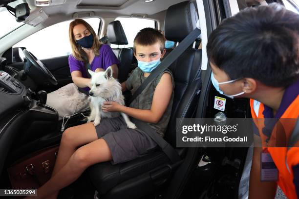 Harrison Nelligan is vaccinated at the drive-through vaccination centre at North Shore Events Centre on January 17, 2022 in Auckland, New Zealand....