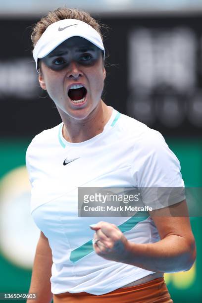 Elina Svitolina of the Ukraine celebrates after winning set point in her first round singles match against Fiona Ferro of France during day one of...