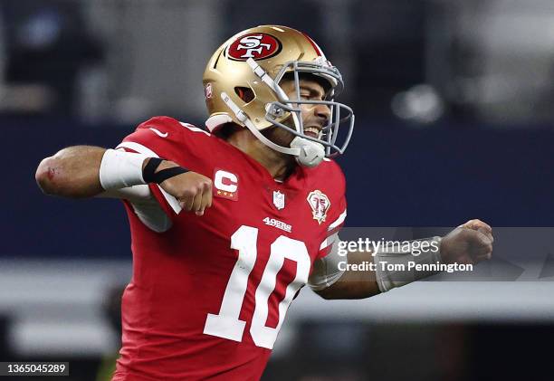 Jimmy Garoppolo of the San Francisco 49ers celebrates after a first down against the Dallas Cowboys during the fourth quarter in the NFC Wild Card...