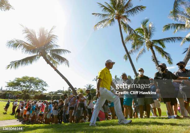 Hideki Matsuyama of Japan walks to the seventh tee during the final round of the Sony Open in Hawaii at Waialae Country Club on January 16, 2022 in...
