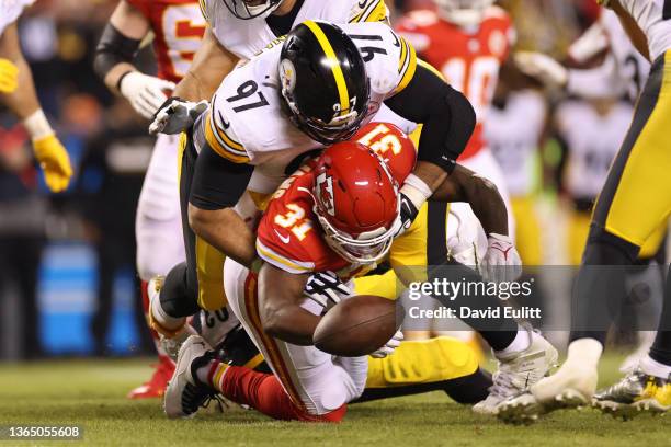 Darrel Williams of the Kansas City Chiefs fumbles the ball after being tackled by Cameron Heyward of the Pittsburgh Steelers in the second quarter in...