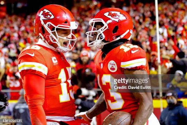 Byron Pringle of the Kansas City Chiefs celebrates scoring a touchdown with teammate Patrick Mahomes in the second quarter of the game against the...