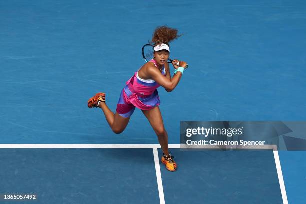 Naomi Osaka of Japan plays a forehand in her first round singles match against Camila Osorio of Colombia during day one of the 2022 Australian Open...