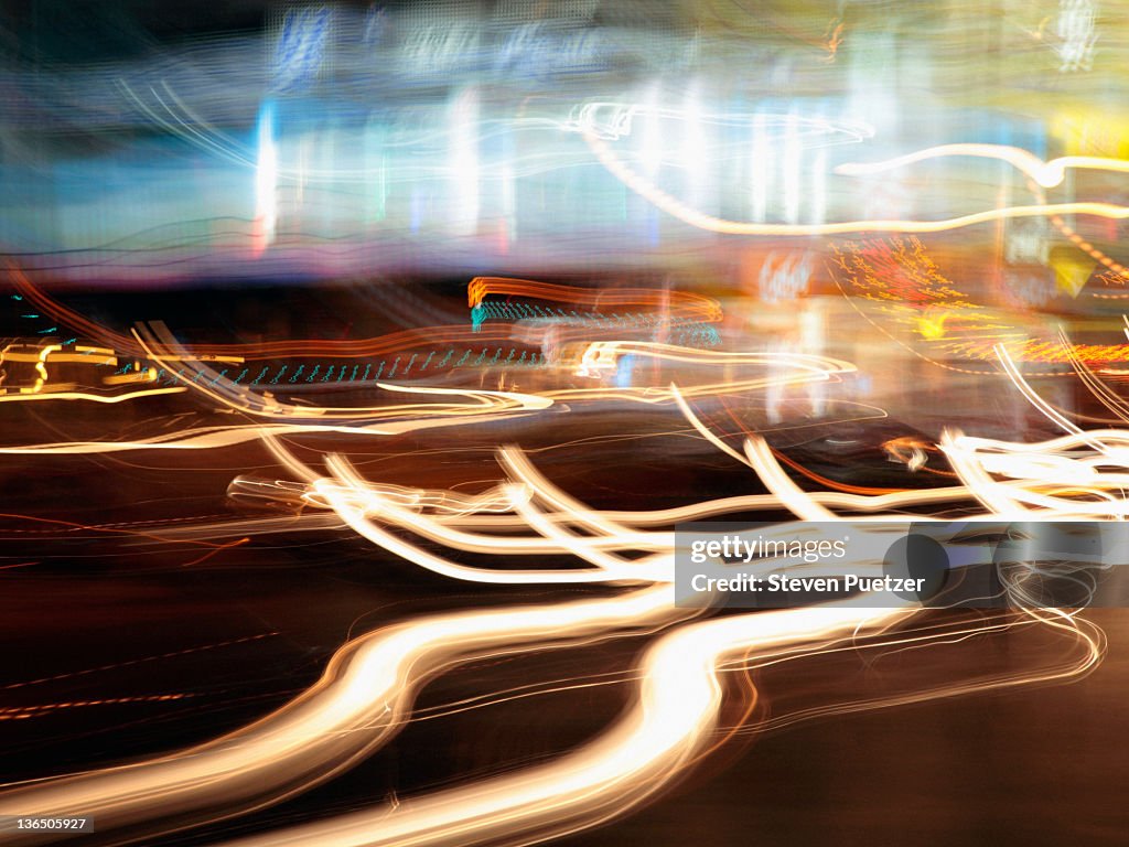 Street with light trails from moving traffic