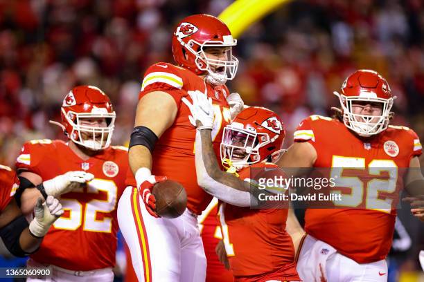 Nick Allegretti of the Kansas City Chiefs celebrates after scoring a touchdown with teammates in the third quarter of the game against the Pittsburgh...