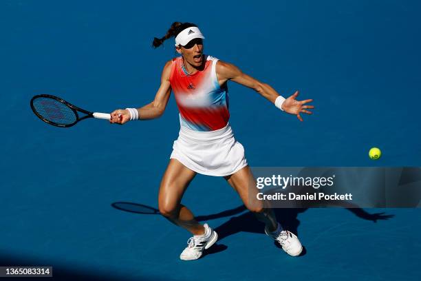 Andrea Petkovic of Germany plays a forehand in her first round singles match against Barbora Krejcikova of Czech Republic during day one of the 2022...